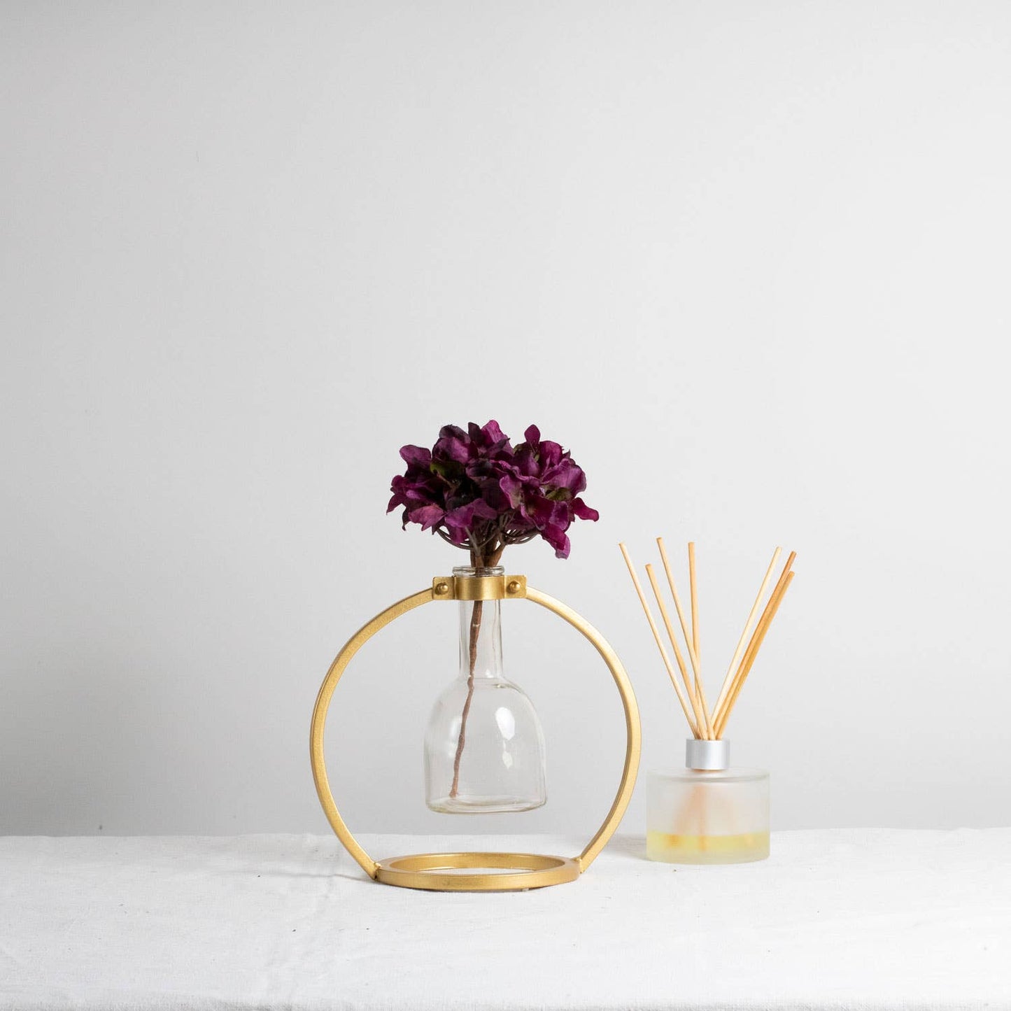 Capstone Floating Glass Bud Vase Brass Finish Metal
